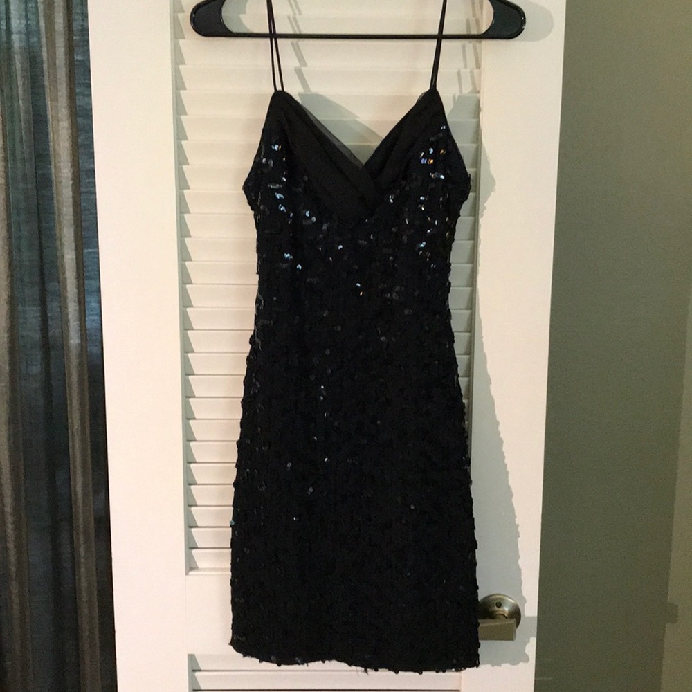 Little black sequined cocktail dress.